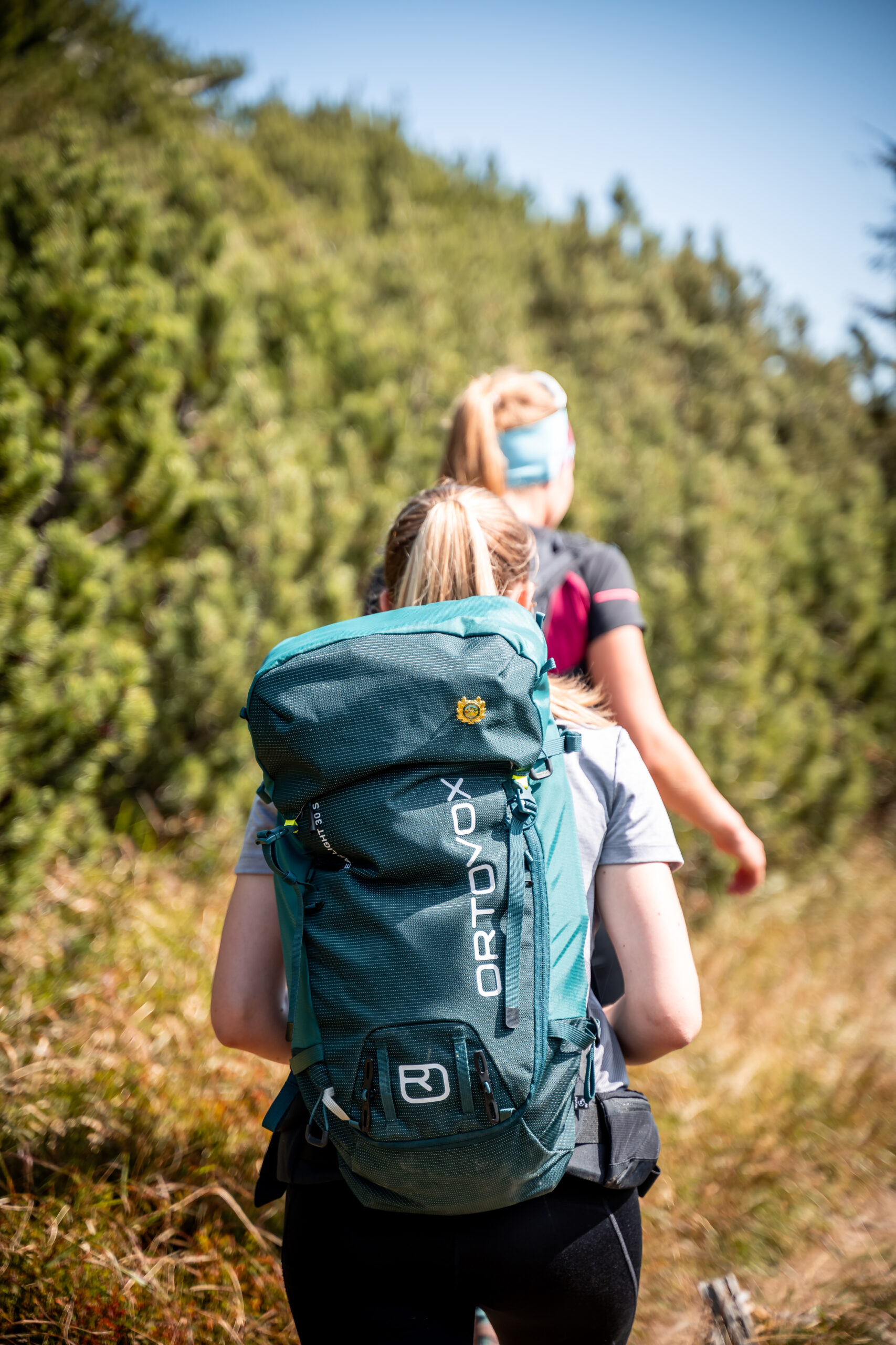 Mit der Wandernadel am Rucksack (TVB Großarltal)